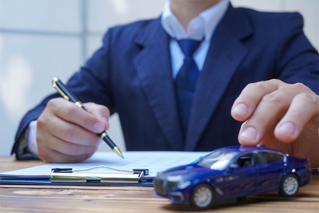 Person reaching for a toy car